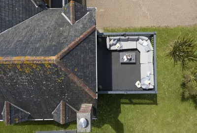 an aerial view of a house with a roof at The Hawthorns in Polzeath