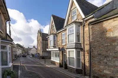 an empty street in an old town with buildings at Room 1, Hotel style double bedroom in Marazion in Marazion