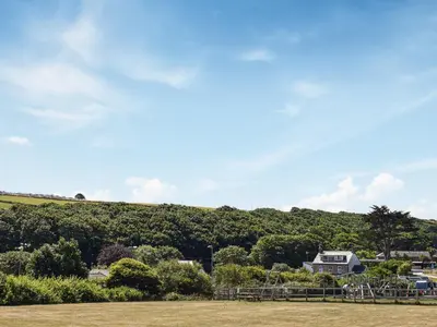 a view of a park with trees and houses at The Annex At Tenniside in Perranporth