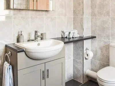 a bathroom with a sink and a toilet at Pentarow in Constantine