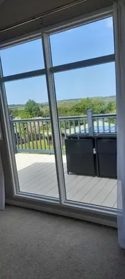 a view from a window of a balcony at Lake view in Newquay