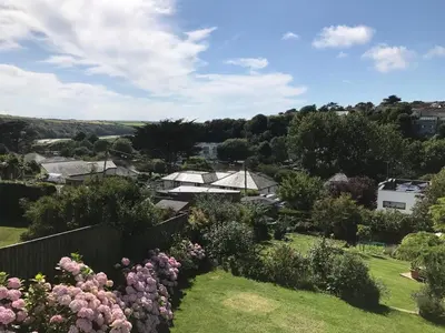 a view of a town with houses and flowers at Pasadena in Newquay