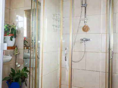 a bathroom with a shower with a glass door at Pasadena in Newquay