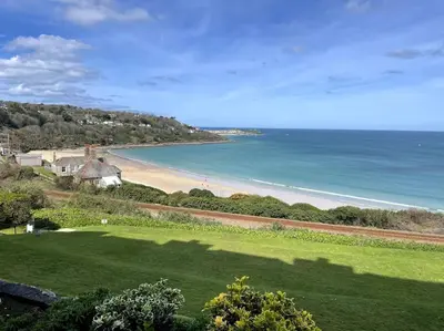 a view of a beach with a house and the ocean at Shoreline - one of the best views? in Carbis Bay