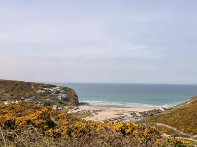 a view of a beach from a hill at Garras in Truro