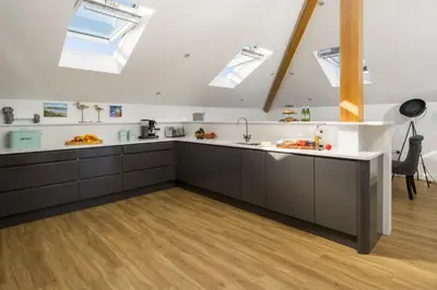 a kitchen with skylights in the ceiling at Cedar Lodge in Carbis Bay