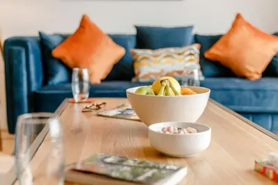 a table with a bowl of food on top of it at 2 Bed in Newquay oc-e26943 in Newquay