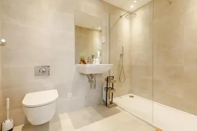 a bathroom with a toilet and a sink and a shower at 2 Bed in Newquay oc-e26943 in Newquay