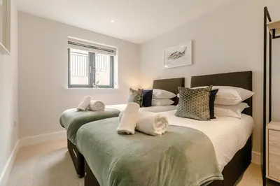 a bedroom with two beds in a room at 2 Bed in Newquay oc-e26943 in Newquay