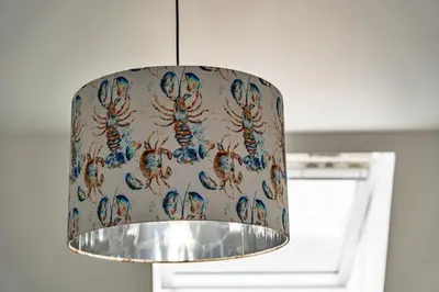 a chandelier hanging from a ceiling in a room at Finest Retreats - Lobster House in Newquay