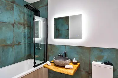 a bathroom with a sink and a shower at Finest Retreats - Lobster House in Newquay