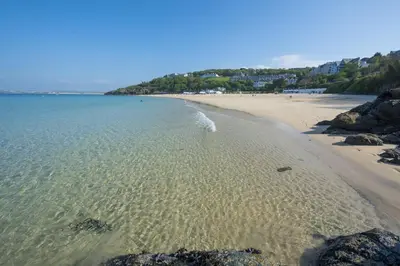 a view of a beach with the sand and water at Cottage By The Sea, Wi-Fi, Pets Accepted in St Ives