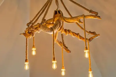 a chandelier with lights hanging from the ceiling at Finest Retreats - Towan House in Newquay