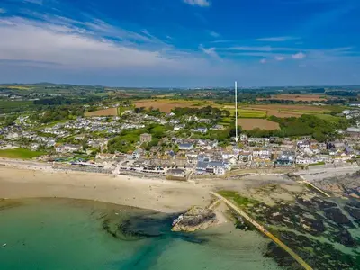 an aerial view of a town on the beach at Marazion Beach Town House with Private Parking in Marazion