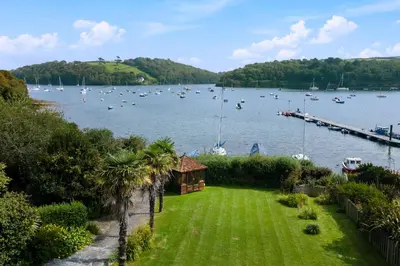 a view of a body of water with boats in it at Seagulls Cottage Cornwall in Saint Mawes
