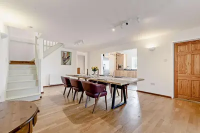 a dining room with a large table and chairs at 5 Bed in St. Merryn oc-t27899 in St Merryn