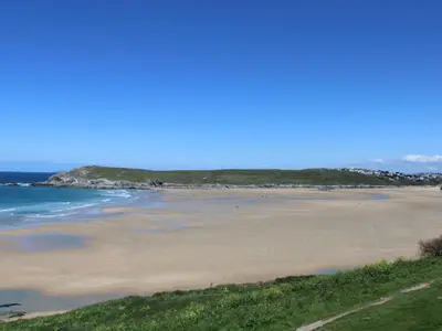 a view of a beach with the ocean at Carines Barns - Tre in Newquay