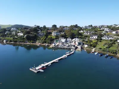 an aerial view of a marina with boats in the water at Pelyn in Saint Mawes