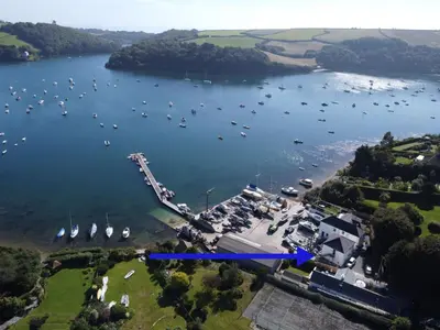 an aerial view of a harbor with boats in the water at Pelyn in Saint Mawes