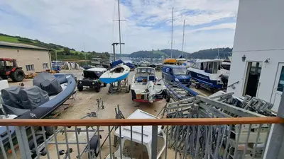 a group of boats are parked in a marina at Pelyn in Saint Mawes