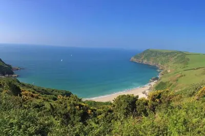 a view of a beach from a hill at Chy Bownder Cottage in Lostwithiel