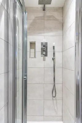 a shower with a shower head in a bathroom at 