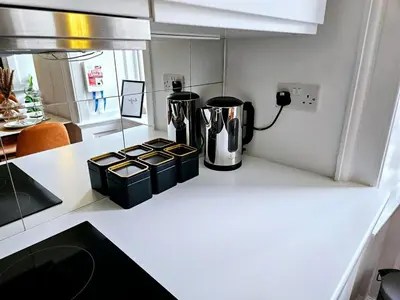 a coffeemaker sitting on a counter in a kitchen at 