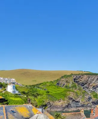 a view from the roof of a house on a cliff at Luxury Fisherman’s Cottage Historic Port Isaac in Port Isaac