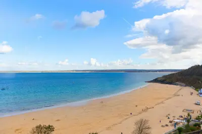 a view of a beach with people on it at 28 Carrack Widden in St Ives