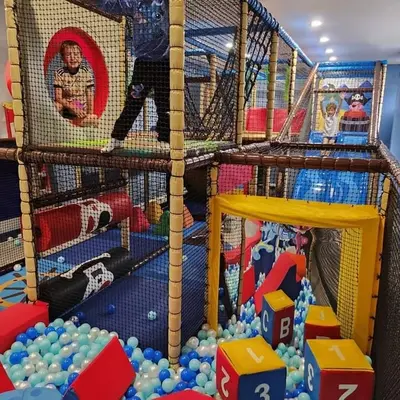 a play room filled with lots of toys and balls at 78 Atlantic Reach in Newquay