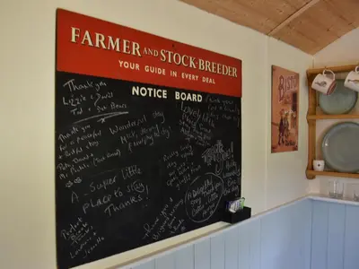 a chalkboard on a wall with writing on it at Field View in St Austell