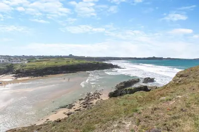 a view of a beach with people walking on the sand at 2 Bed in Newquay oc-a28105 in Newquay