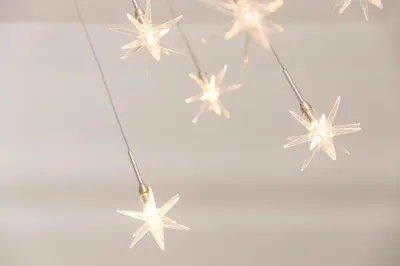 a group of stars hanging on a wall at Polmoor in St Ives