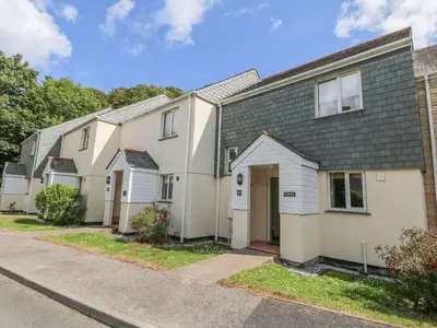 a row of houses on a street at Manuka in Falmouth