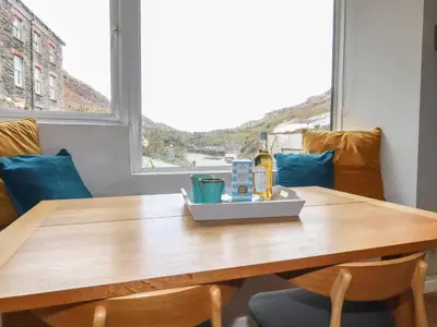 a table with a tray of food on top of it at Harbour Light in Boscastle