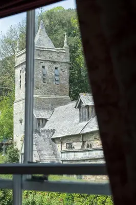a view of a castle from a window at The Old Mill House in Padstow