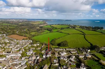an aerial view of a small town with a red rectangle in the middle at Delightful Family Getaway Cornwall in Mawnan Smith