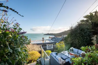 a view of the ocean from the balcony of a house at Chy an Mor in Coverack
