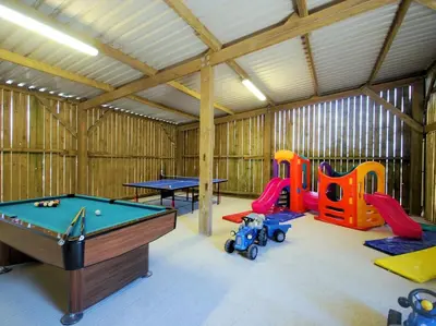 a play room with a pool table and play equipment at 3 Bed in Helston oc-htfox in Saint Martin