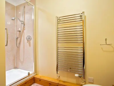 a bathroom with a shower and a toilet at 3 Bed in Helston oc-htfox in Saint Martin