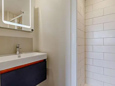 a bathroom with a sink and a mirror at 3 Bed in Truro oc-81488 in Saint Just in Roseland