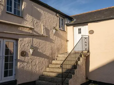 a set of stairs next to a building at 1 Bed in Helston oc-41381 in Cury