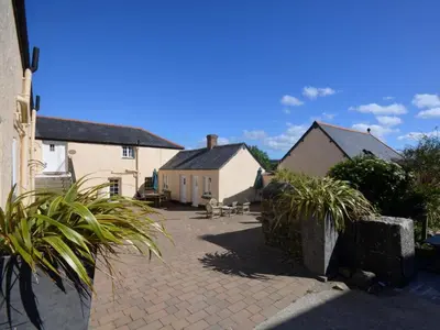 a courtyard of a house with some plants at 1 Bed in Helston oc-41381 in Cury