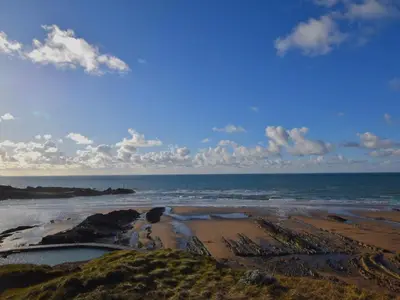 a view of a beach with the ocean at 2 Bed in Holsworthy oc-82455 in Week Saint Mary