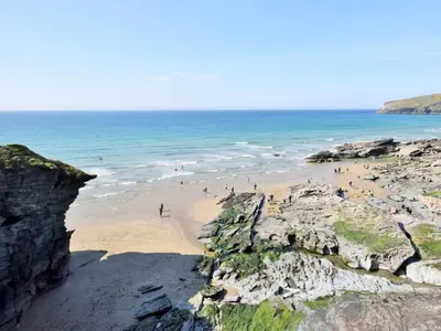 a group of people on a beach near the ocean at 2 Bed in Launceston oc-85894 in South Petherwin