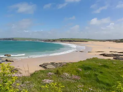 a view of a beach with people in the water at 2 Bed in Wadebridge oc-82682 in Little Petherick