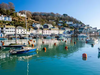a group of boats in the water in a harbor at 1 Bed in Looe oc-88434 in Lanreath