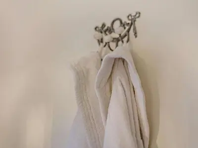 a towel is hanging on a hook on a wall at 4 Bed in Boscastle oc-47035 in Boscastle