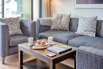 a living room with two couches and a coffee table at 2 Bed in Harlyn Bay oc-a28321 in St Merryn