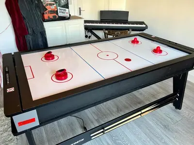 a ping pong table with red ping pong balls on it at 2 Bed in Redruth oc-86269 in Gwennap